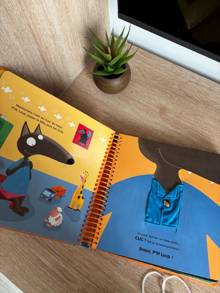 Livre apprends à t’habiller avec p’tit loup Auzou éveil - photo numéro 3