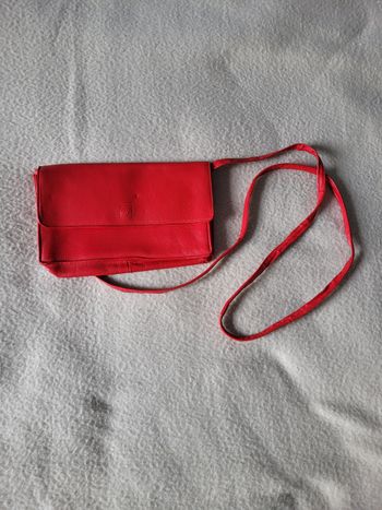 Pochette avec bandoulières en cuir