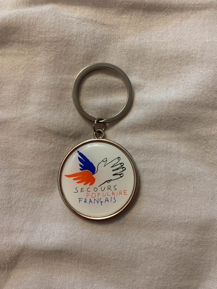 Porte clé Secours populaire français