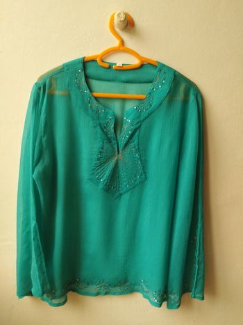 Haut bleu turquoise transparent taille 38