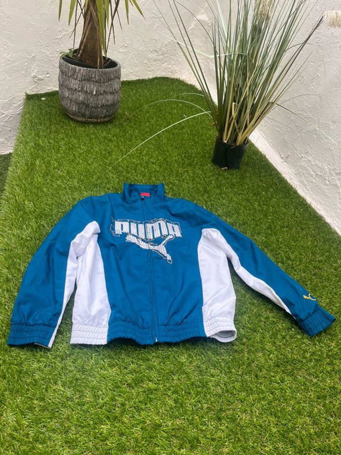 Très belle veste Puma taille M junior