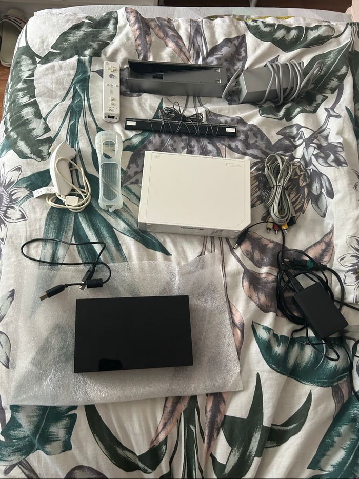 Wiii + accessoires+ disque dur externe contenant des centaines de jeux
