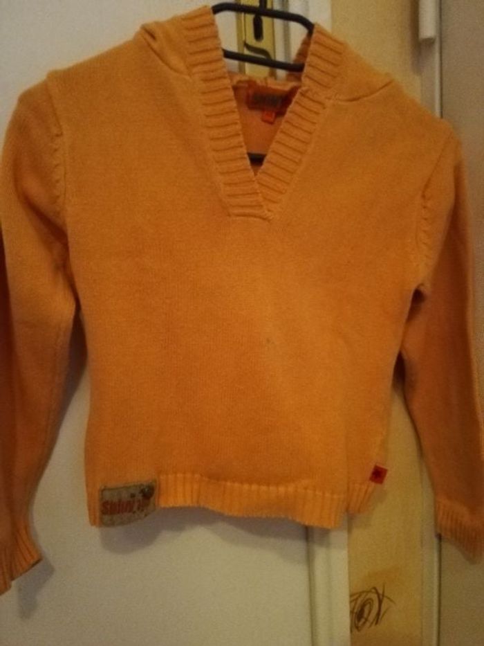 Pull avec capuche 8ans.