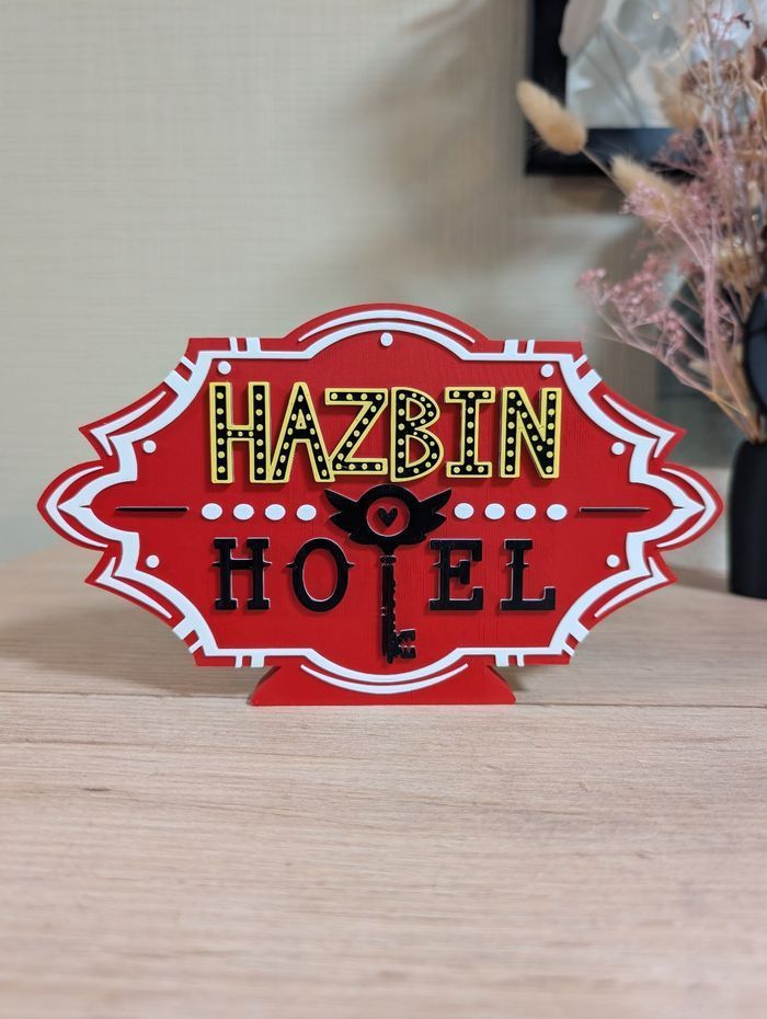 Hazbin Hotel logo décoratif 21x12cm Excellent état