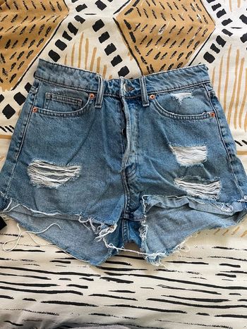 Short troué en jean