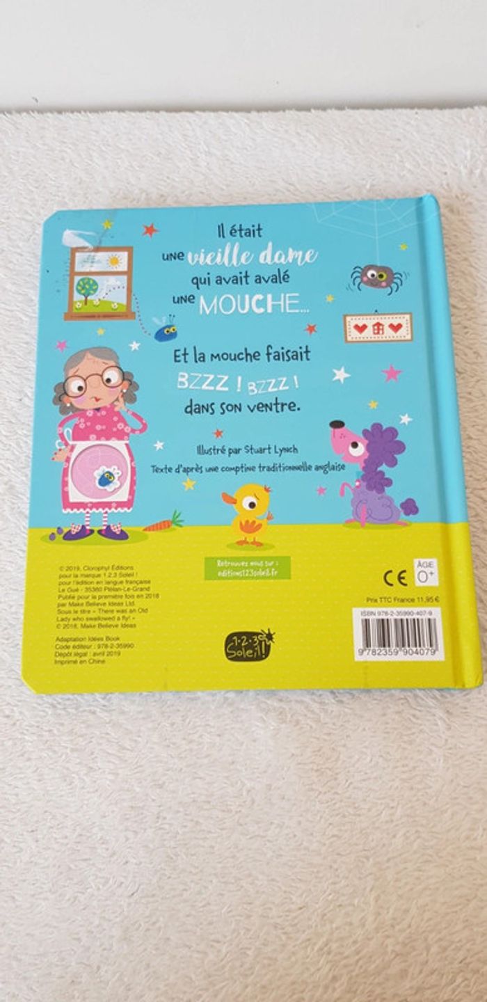 Livre il était une vieille dame qui avait avalé une mouche - photo numéro 2