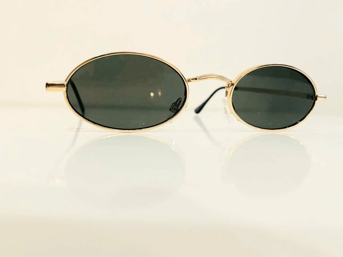 Lunette de soleil mixte ovale dorée verres verts uvprotection catégorie 3 taille moyenne - photo numéro 4