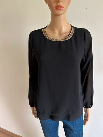 Blouse noire et dorée à manches longues taille unique excellent état