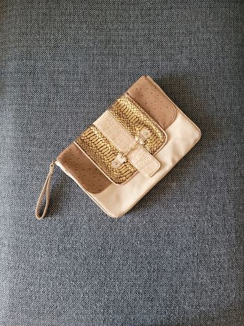 Magnifique pochette de poignet grande taille