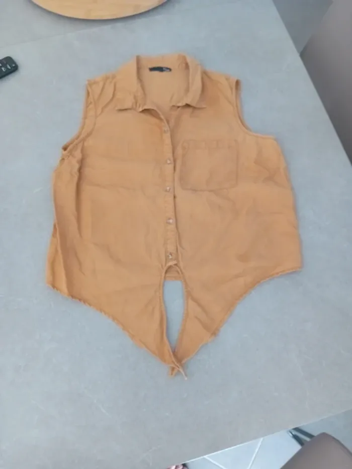 Chemisier sans manche taille L/40