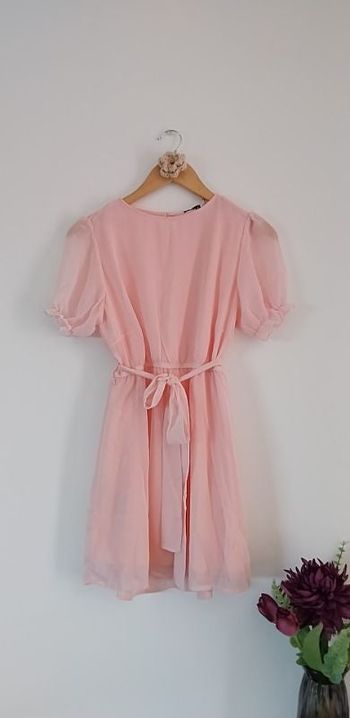 Craquante robe rose poudré