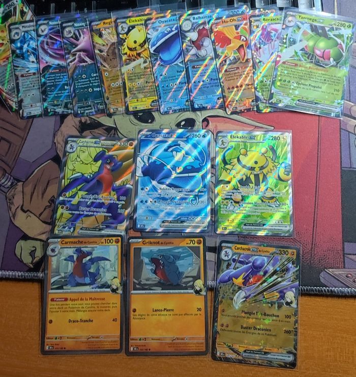 Lot cartes EV10 Rivalités destinées team rocket : carchacrok promo svp 204 + 2 cosmo promo + 2 full art eleka le 212 et oyacata 211 + 12 ex ( dont ho oh nidoking nostenfer persona et carchacrok etc ) Pokemon par Asmodée bloc écarlate et violet - photo numéro 2