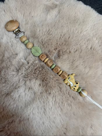 Attache tétine lion