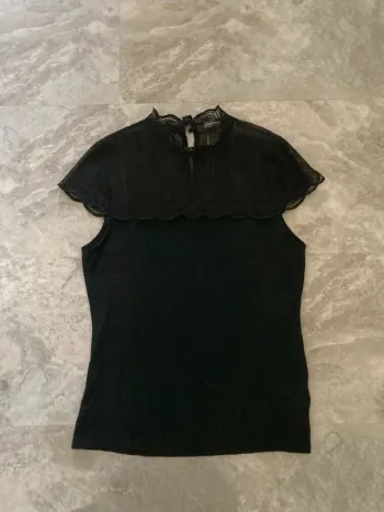 Tee shirt Lulumary taille 42/44 en bon état