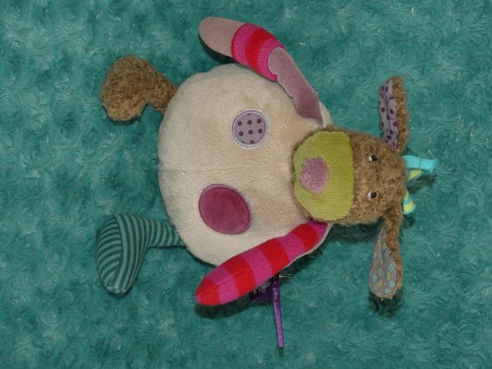 Doudou chien musical Moulin roty jolis pas beaux 🐶