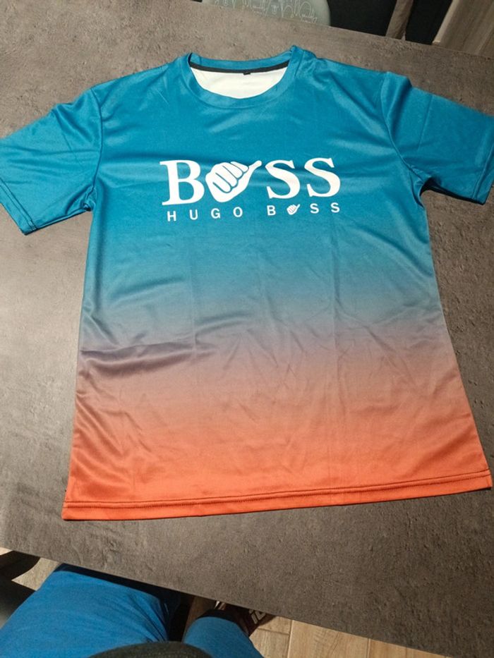 Maillot homme "boss#. Taille L bleu orange