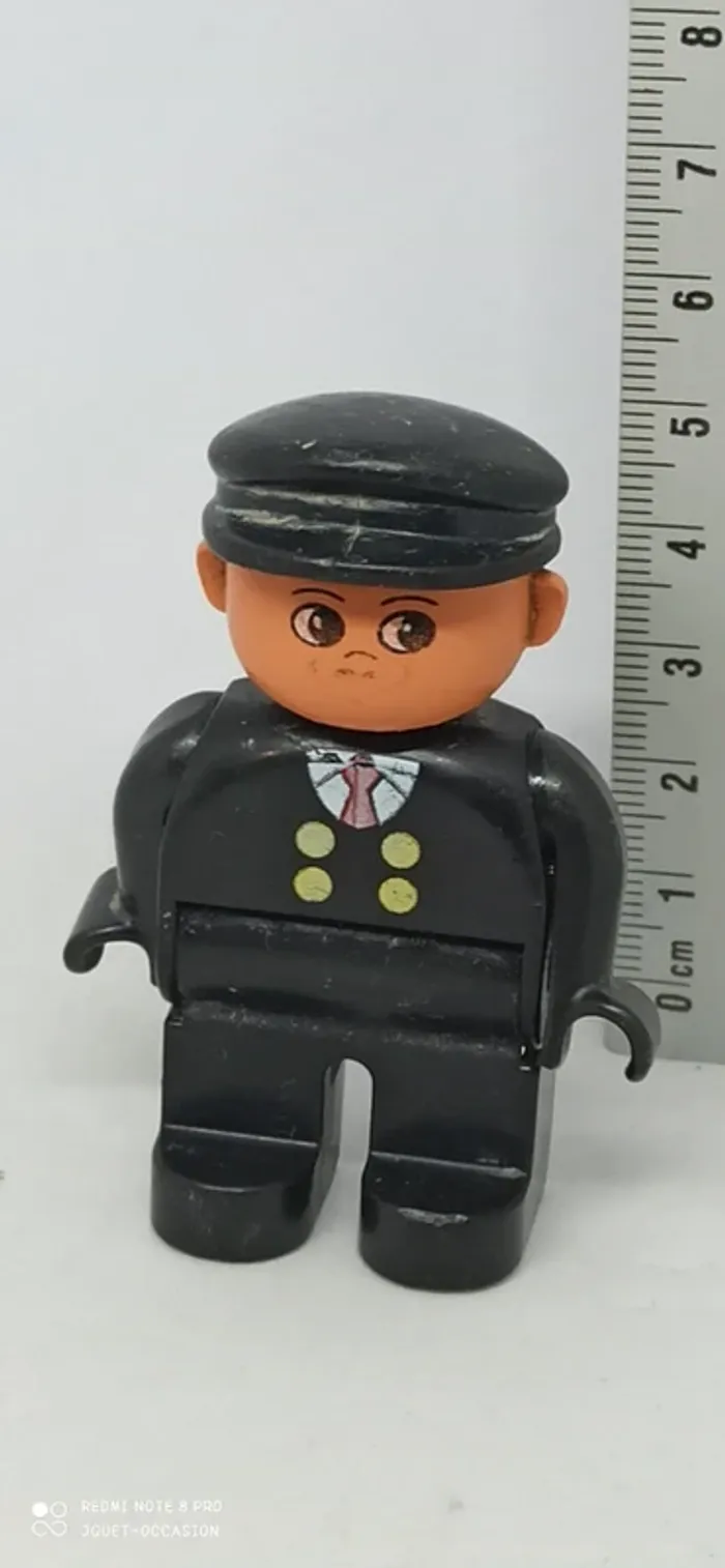 Homme en costume noir lego duplo