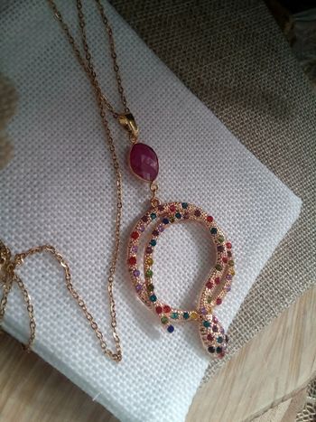 Collier serpent avec pierre de rubis brute