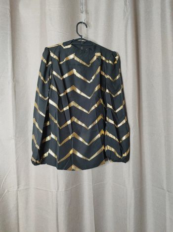 Blouse noir et doré
