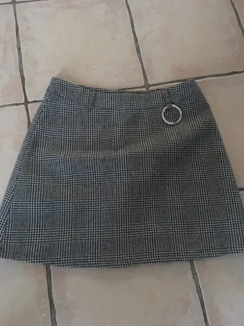 Magnifique jupe de chez Primark  taille 38 en pied de poule en excellent état