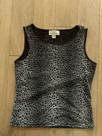 Débardeur panthère 123 taille 38/40 très bon état