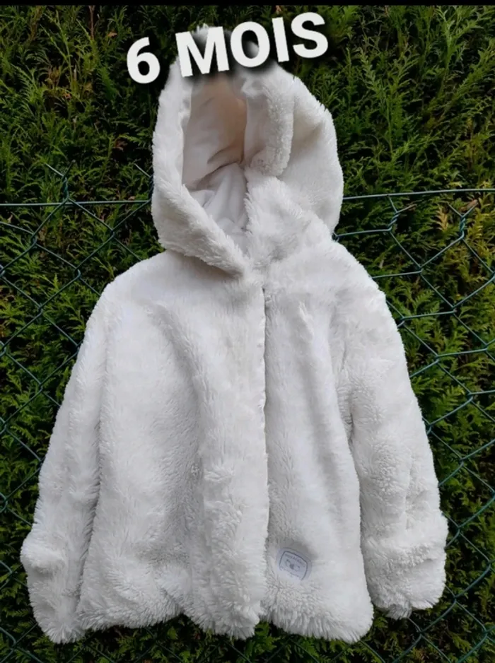 Manteau fausse fourrure