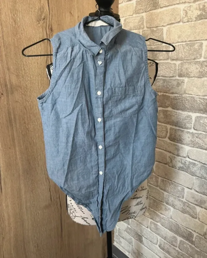 Chemise sans manches fille taille 11/12 ans