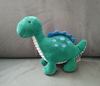 Peluche. Doudou dinosaure vert bleu et blanc. Tex. 20 cm