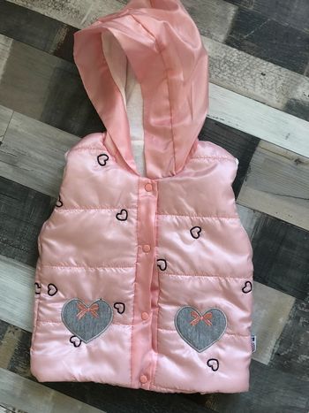 Veste sans manche à capuche
