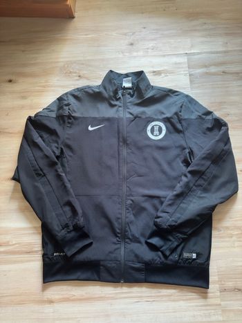 Veste Nike Dri-FIT Team Football noire/grise en bon état.