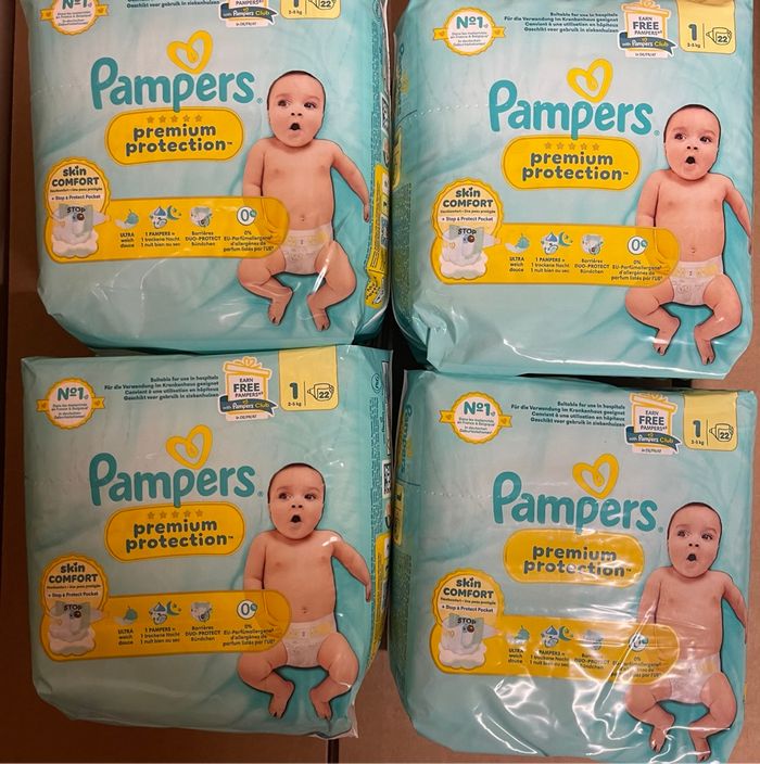 4 paquets de couche taille 1