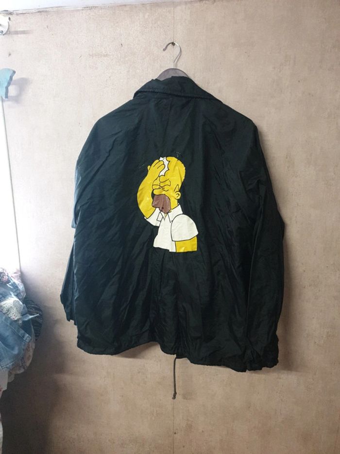 Coupe vent veste par dessus manteau parka