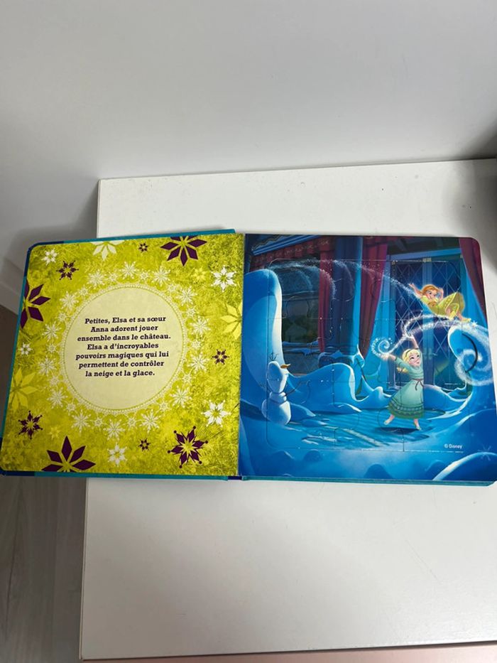 Livre puzzle la reine des neiges neuf - photo numéro 4
