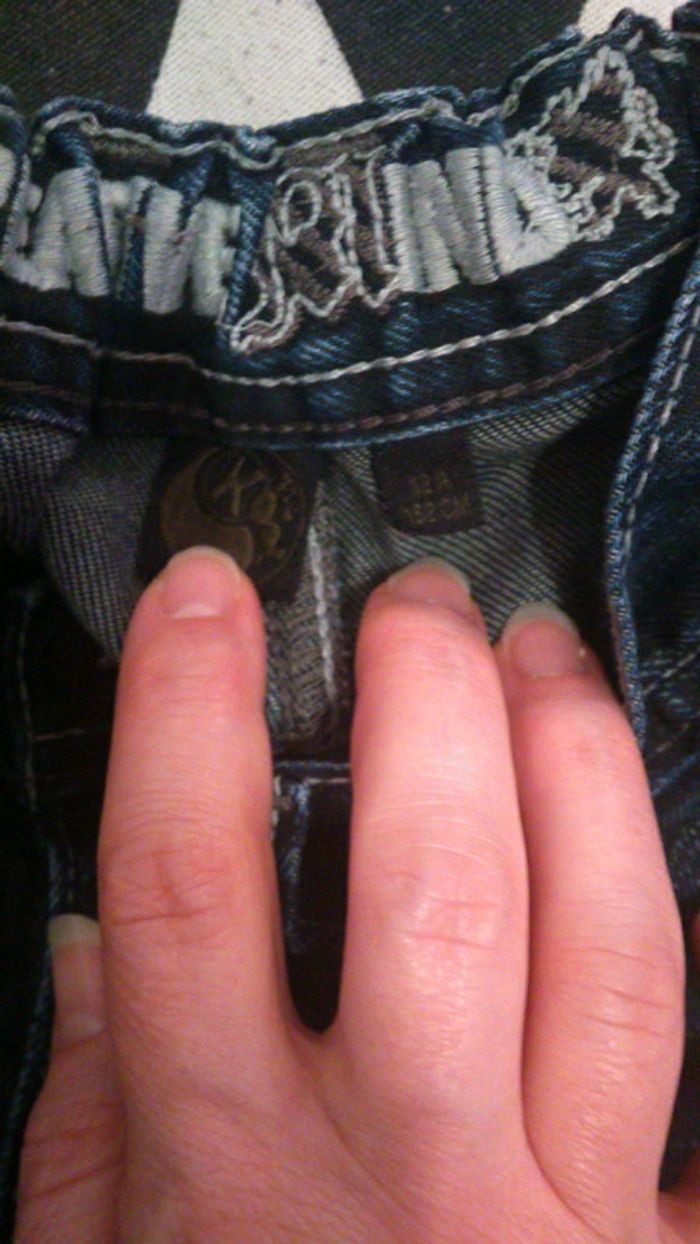 Jean bleu délavé - photo numéro 3