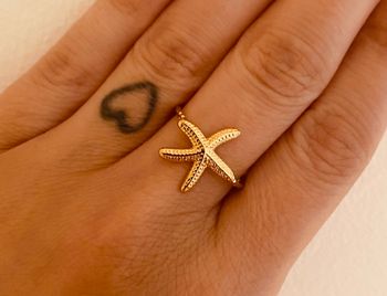 Bague fine torsadée ajustable doré étoile de mer acier inoxydable