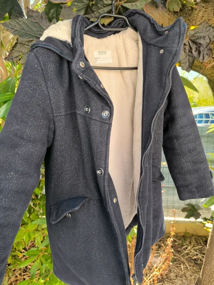 Manteau chaud tape a l'oeil