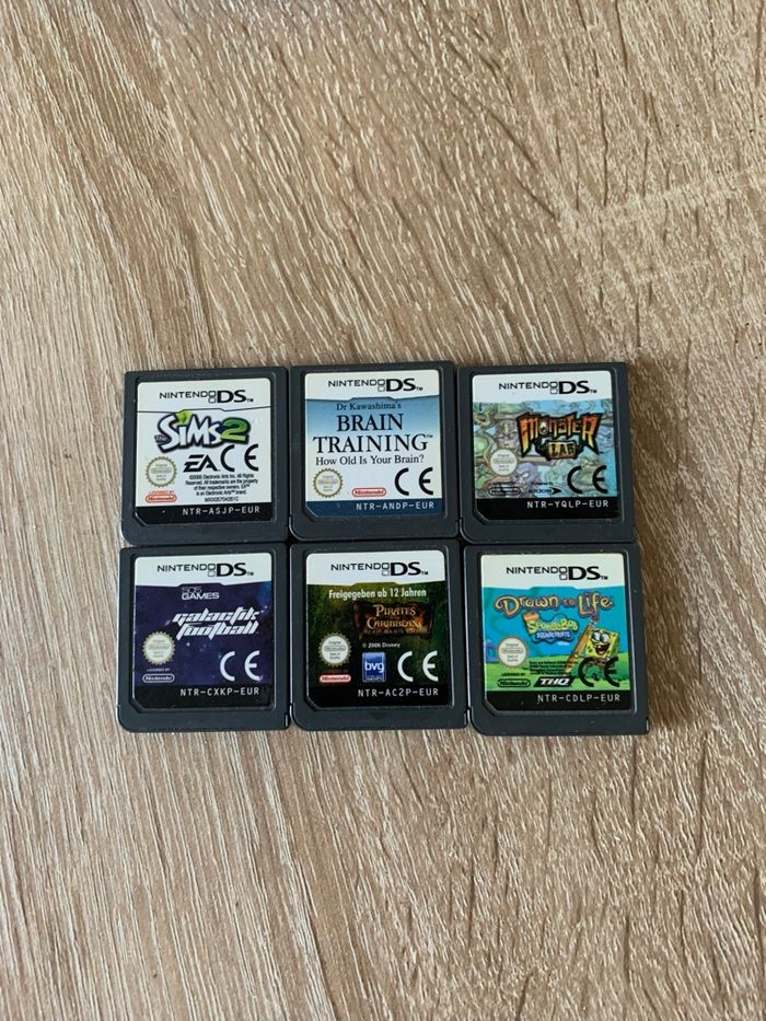 Lot de jeux ds + une boîte de rangement des jeux - photo numéro 3