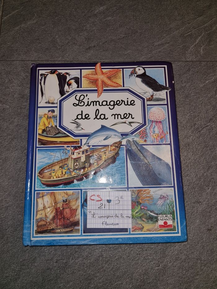 Livre l'imagerie de la mer à couverture est abîmé voir photo