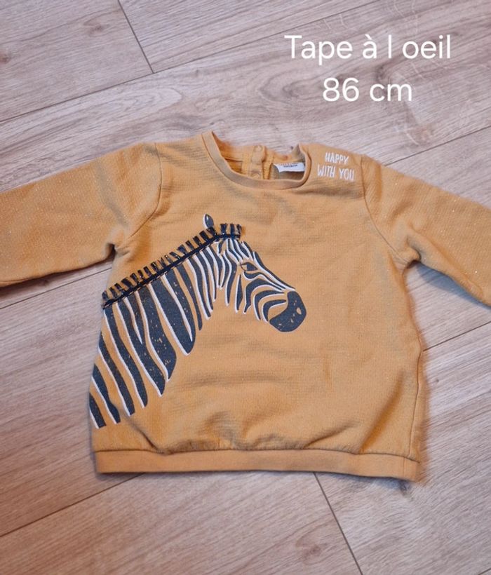 Pull avec zèbre moutarde