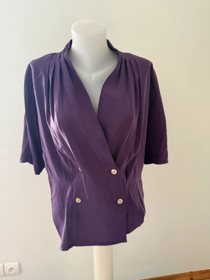 Blouse vintage prune en très bon état taille 42 fléses