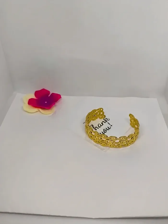 Bracelet manchette dorée maille marine triple rang