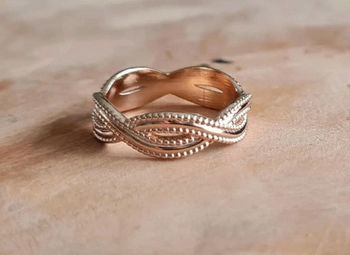 Bague torsadée à l'infini plaqué or taille 56 neuve