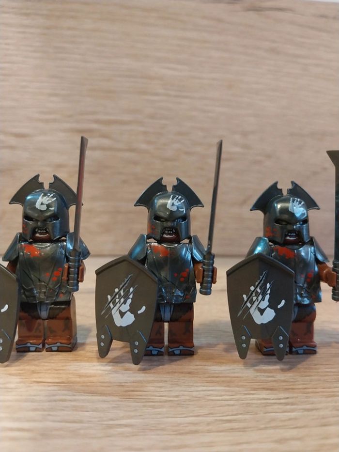 Figurines type lego 4 guerriers orcs seigneur des anneaux - photo numéro 2