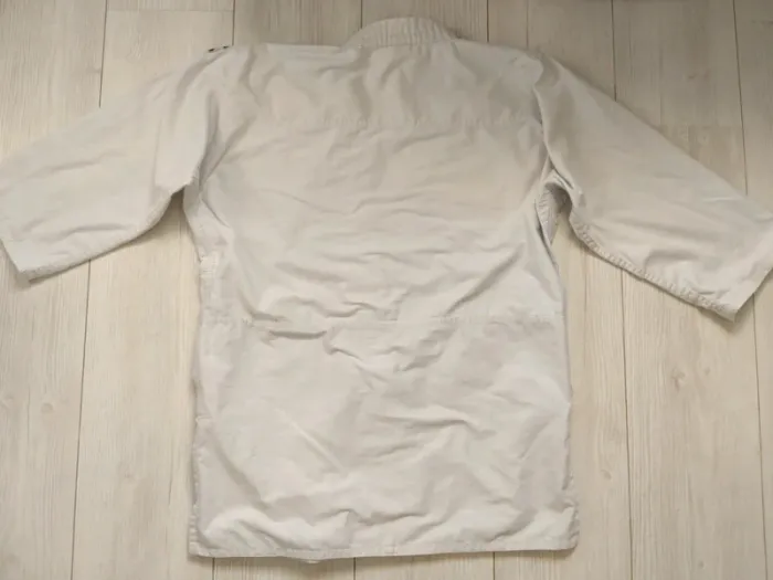 Haut de kimono judo veste arts martiaux Outshock taille 150 - photo numéro 4