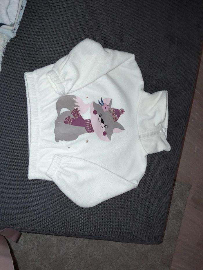Pull beige petit chat, col zippé