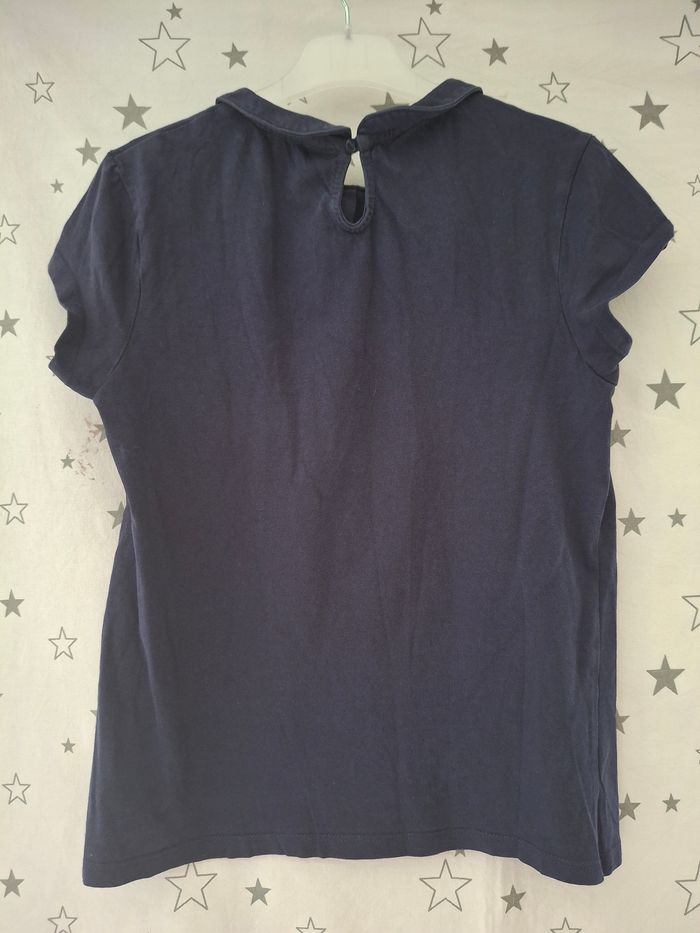 Tee-shirt bleu marine avec col rond 12 ans DPAM
Petit bouton derrière
Très bon état ni trous ni tache - photo numéro 5