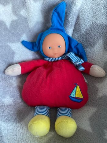 Doudou poupée corolle rouge 