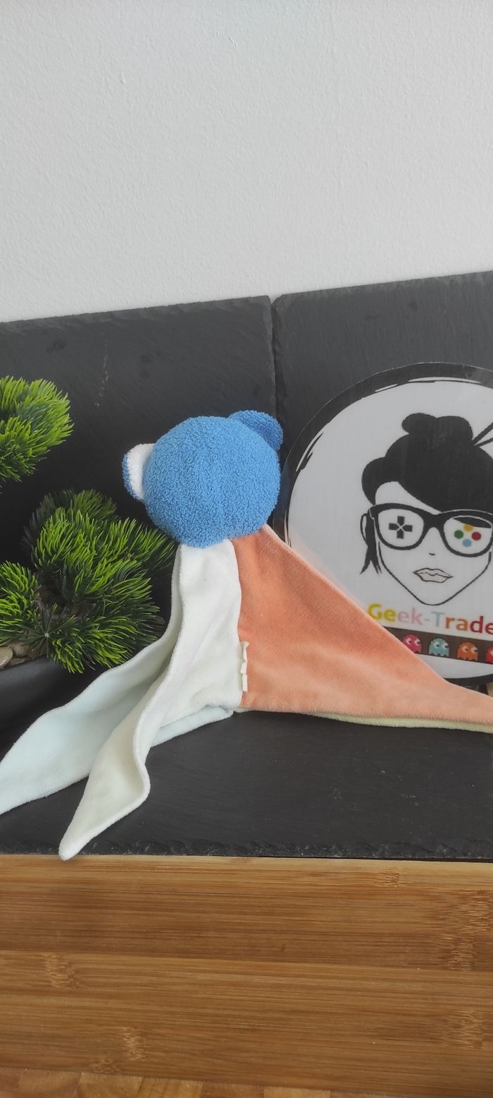 Doudou ours Musti Mustela triangle plat jaune orange bleu blanc Ancien Publicité - photo numéro 2