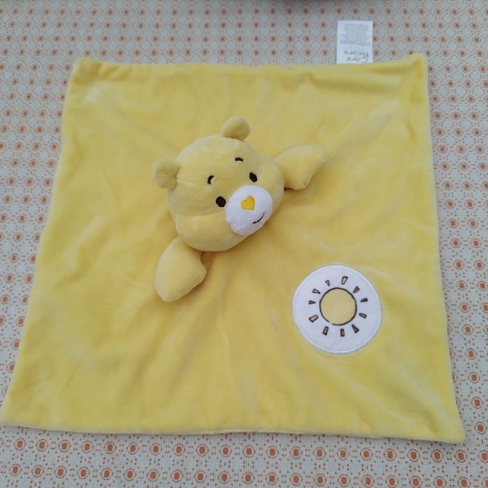 Doudou Bisounours plat jaune
