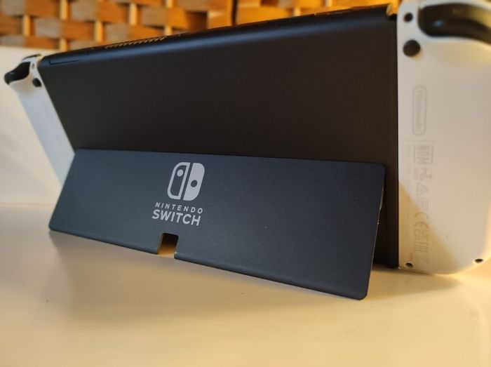 Console Nintendo Switch OLED Blanc 64Go + 2 Jeux + Sacoche + Carte Micro SD - photo numéro 4